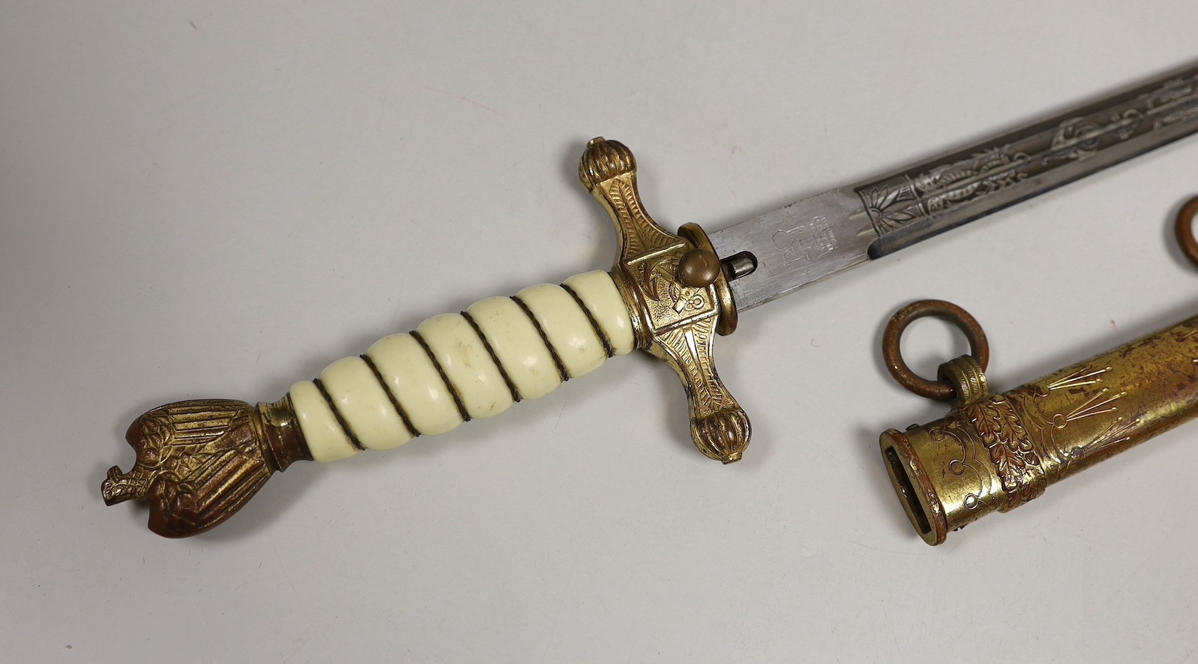 A German Third Reich Kriegsmarine Officer’s Dagger and sheath by Eickhorn, Solingen. Total length 42.5cm